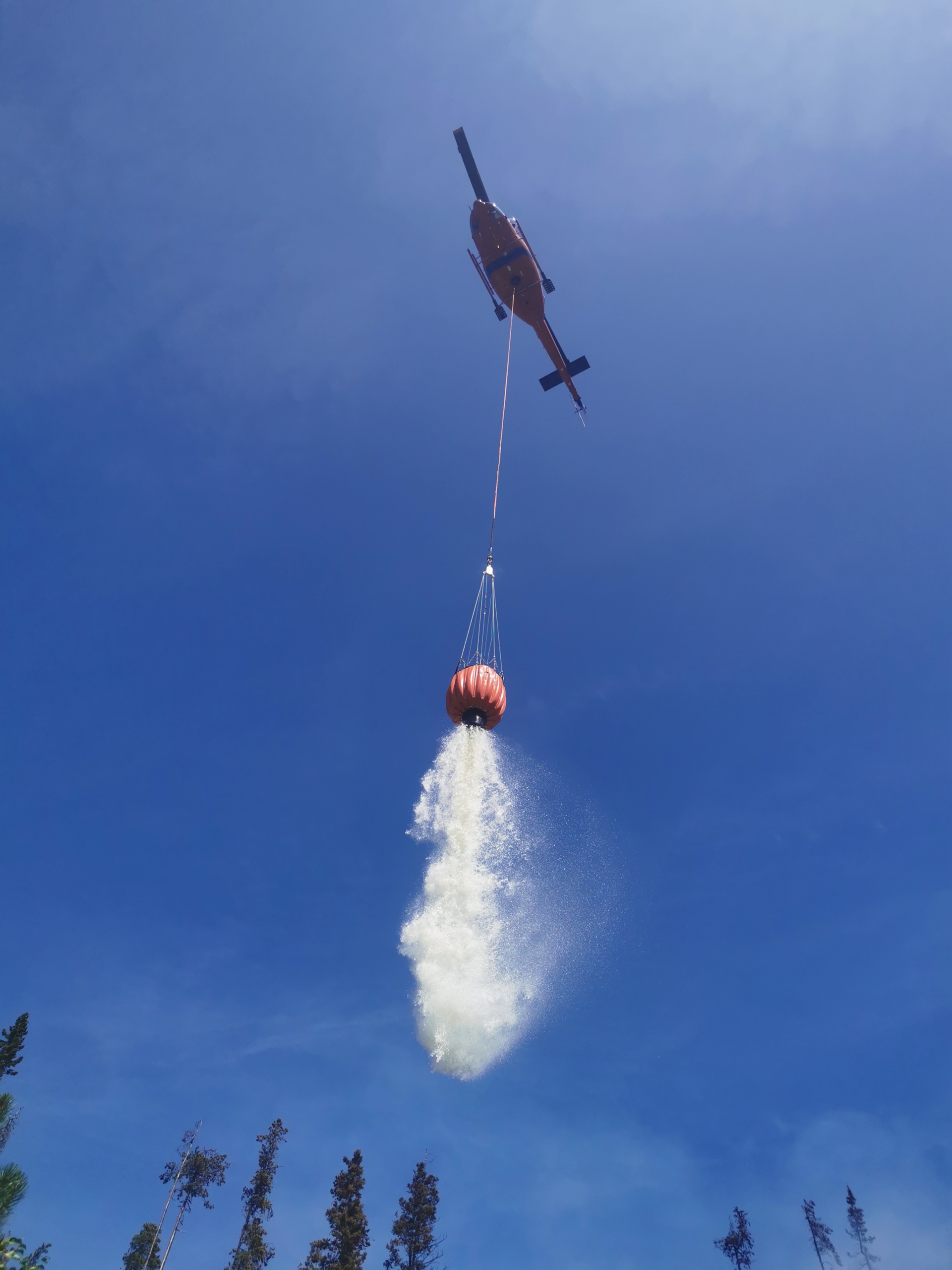 Watering buckets over flames